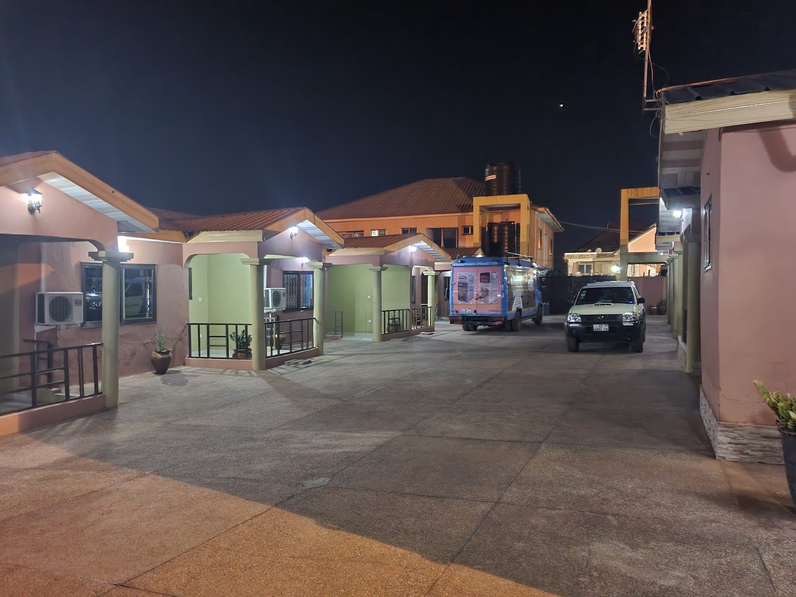 MagJohn Hotel's quiet compound illuminated at night